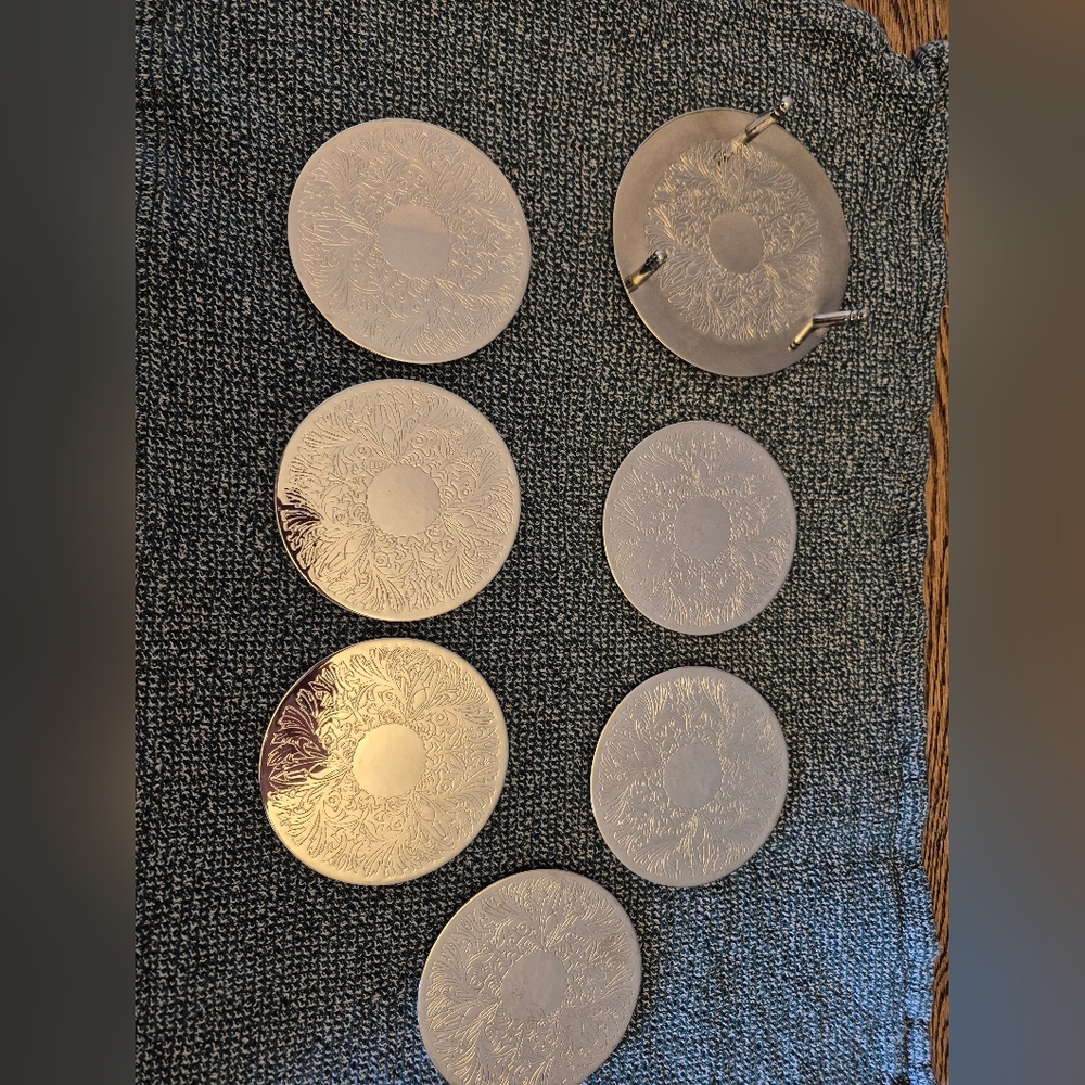 Elegant Silver Coasters Set